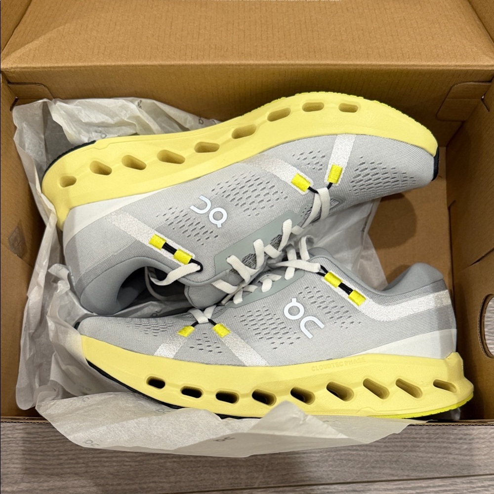 On Running Gray and Yellow Athletic Shoes